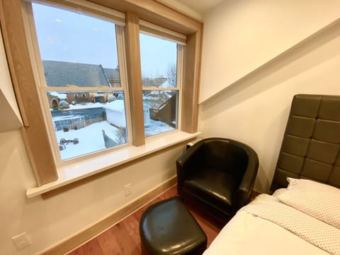 Bedroom upstairs with two full beds.
