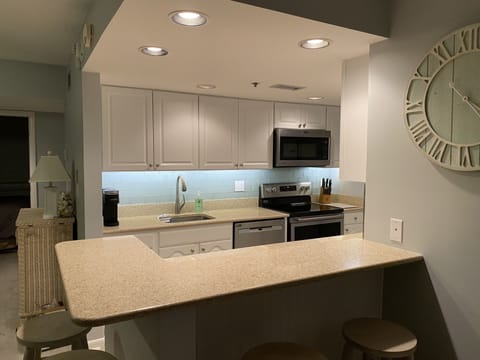 Upgraded kitchen 2021 - new appliances, subway tile, granite counters!