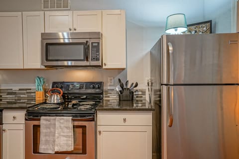 Kettle, stove, microwave, fridge