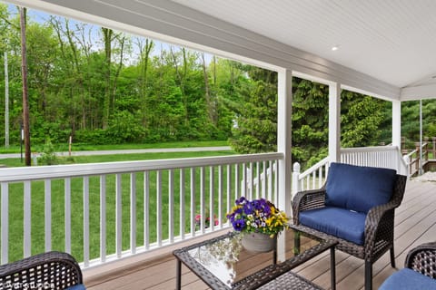 Enjoy watching everyone walking to and from the beach underneath the ceiling fan
