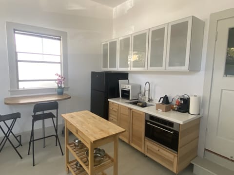 Kitchenette with island and breakfast bar- New and Clean