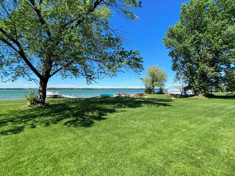 East shore private beach.  50 ft dock with 3 lakefront Cottages .