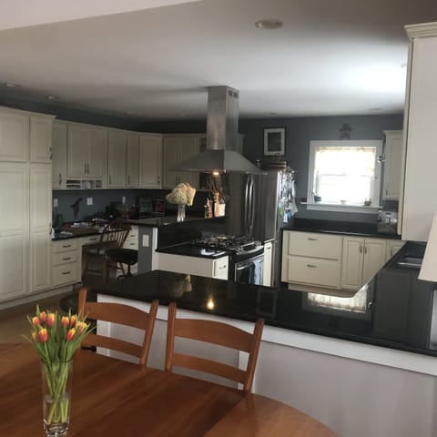 Large kitchen with dining area that seats 8
