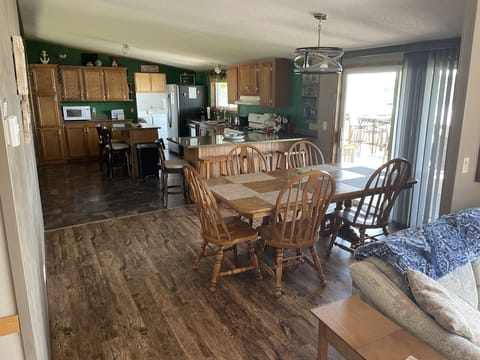 dining area, breakfast bar and kitchen