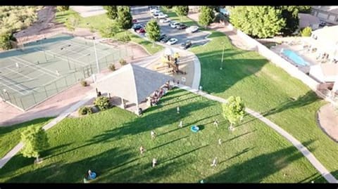 Tennis courts and one of the covered areas at the park.