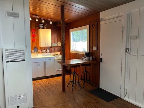 kitchen, dining area and entryway