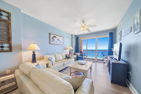 Bright and relaxing living room that opens directly onto the spacious balcony.