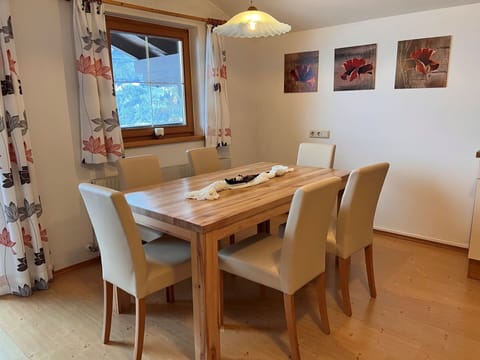 Furniture, Property, Table, Window, Picture Frame, Chair, Wood, Building, Curtain, Flooring