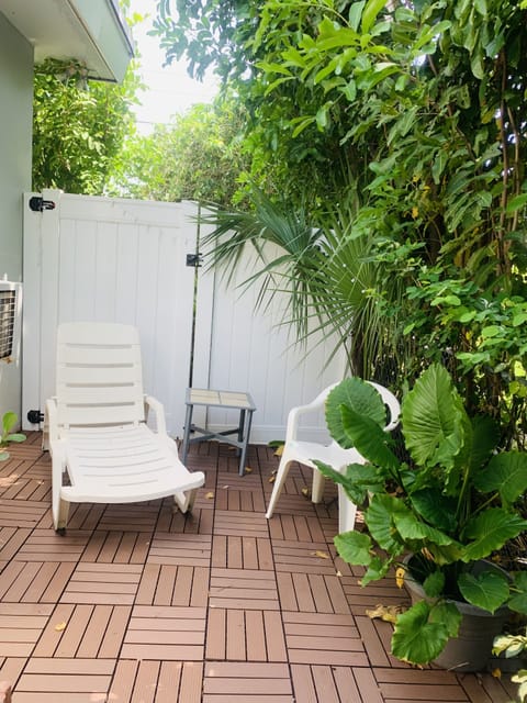 Tranquil Patio with Privacy and Table & Chairs.