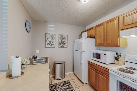 Kitchen includes dishwasher, garbage disposal, stove, microwave, full refrigerator and Keurig with k-cups provided. 