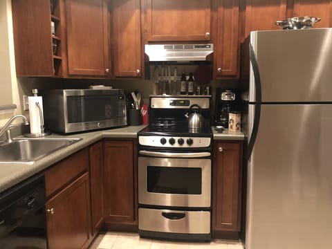 Kitchen with stainless steel appliances.
