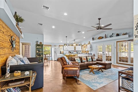 Large great room with leather sectional (queen sleeper) & daybed w/  2 twin bed