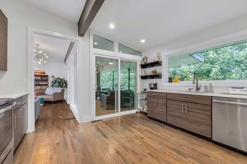 Kitchen - Open-concept kitchen features all new cabinetry and stainless-steel appliances.