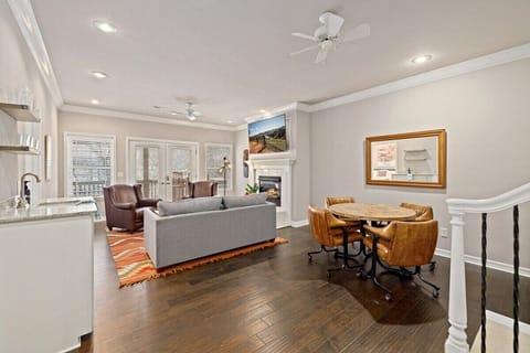 Venture downstairs to our SECOND living room, complete with a wet bar, a variety of board games, and a game table.