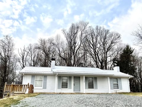 Kathleen's Cottage pre-Spring Landscaping (flowering bushes coming)!