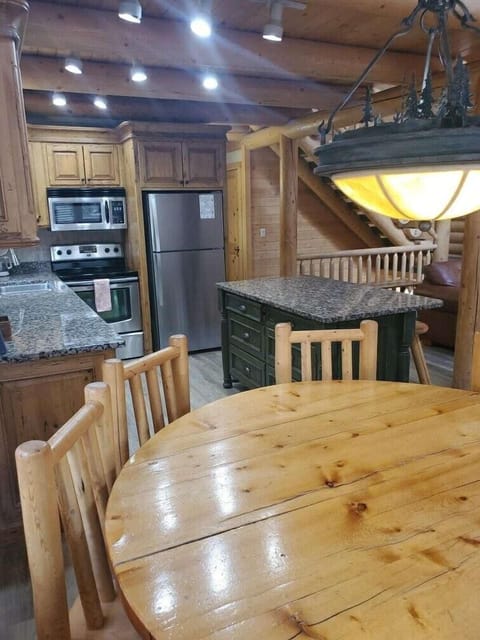 Prepare your own meals and eat together in the kitchen and dining area.