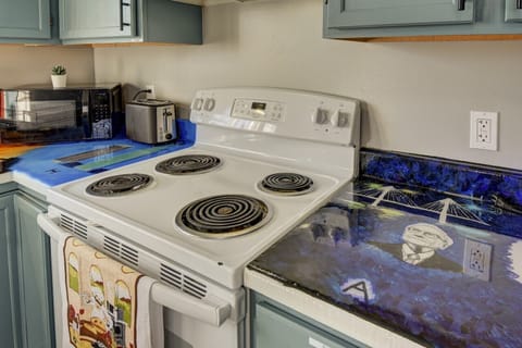 Local artist painted countertops, featuring Warren Buffet