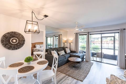 Living room view lookin out to the Covered Lanai area.g room