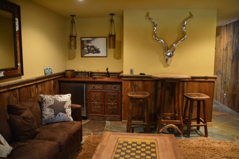 Bar and game tables in family room