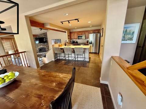 three stools at the bar plus six chairs at the dining table.