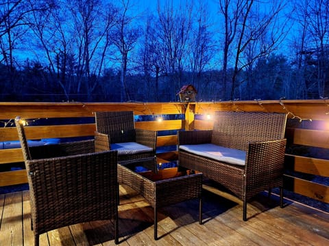 Deck with comfortable patio set located just off the kitchen