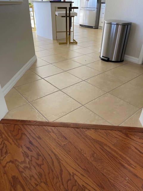 Floor from the dining area to the kitchen