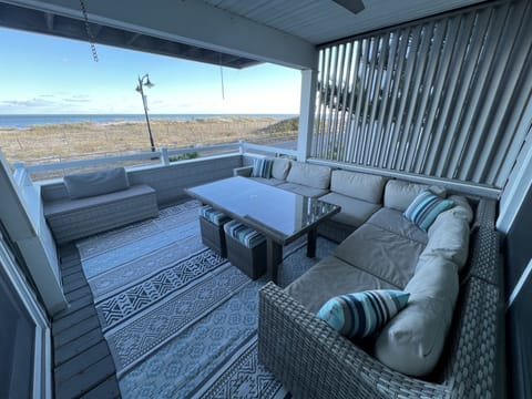 Deck with ocean view and alfresco dining option