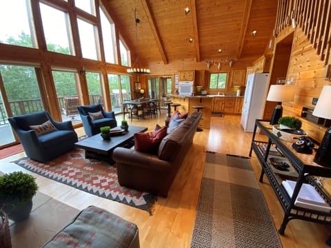 Inviting great room with view into kitchen and dining room