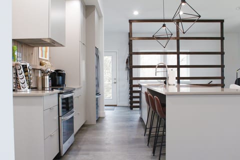 Don't miss any of the action in our open, fully stocked kitchen with lg. island!