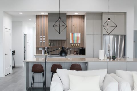 Modern kitchen with everything you need- even large pantry space and serveware!