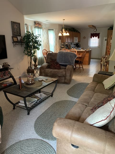 Living Room with plenty of comfortable reclining seating for everyone. 