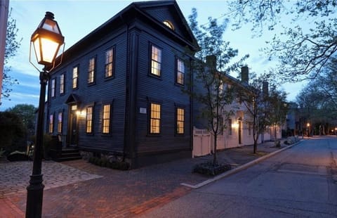 Front of house with parking space