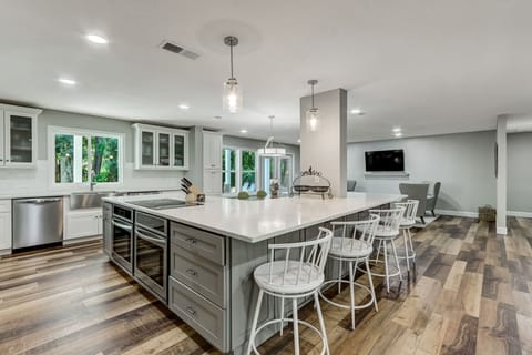 Spacious Kitchen with Huge Island, Beautiful Granite Countertops, Stainless Steel Appliances, Two Dishwashers, Double Oven, Double Refrigerator, Coffee Bar and Sitting Area