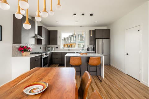 Full kitchen with Keurig coffee maker.