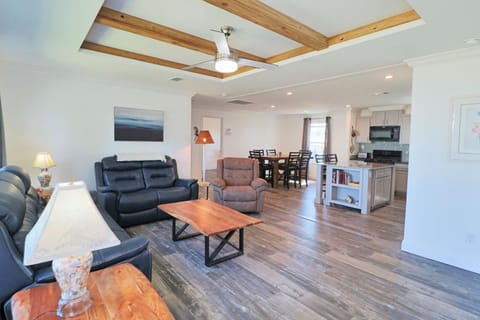 The open concept living, dining and kitchen is beautifully appointed.