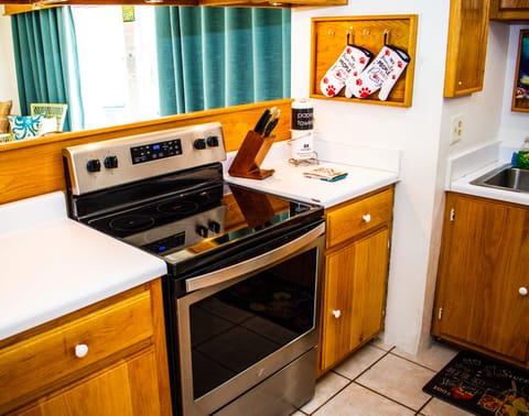 Fully stocked kitchen with additional utensils, tools and supplies