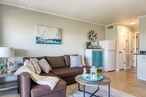 Relax on the comfortable sofa with chaise lounge.