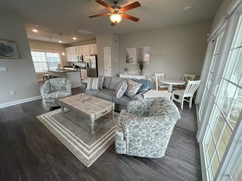 Open concept living area that opens to the 2nd floor deck