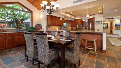 Dining table with seating for six, plus 5 total in kitchen