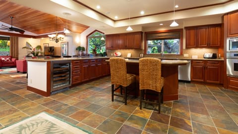 Wine fridge and high-end appliances with additional island seating