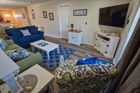 Common area with one queen sofa bed and one twin cot