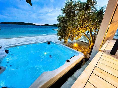 From the whirlpool you have an incredibly good view of the great great sea. The whirlpool is in front of the house.