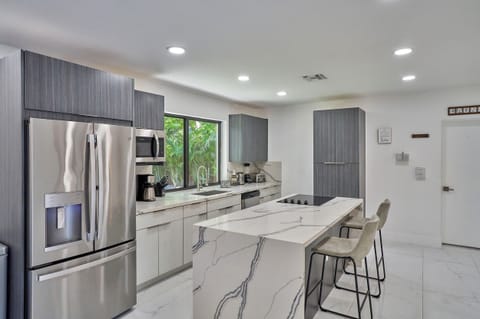 Modern kitchen with brand new appliances.