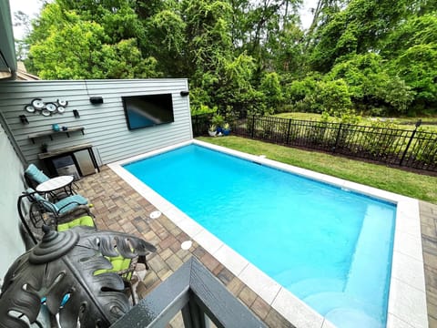 Private yard. Heated pool. 85”TV, ice maker, refrig.