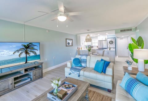 Living area with a big screen TV and an exxtra air mattress