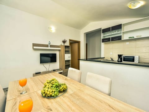 Cabinetry, Property, Furniture, Building, Couch, Food, Wood, Countertop, Orange, Interior Design