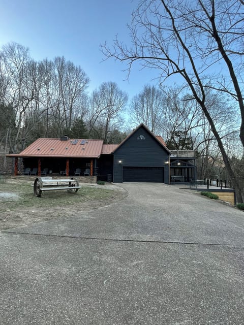 Newly renovated with large 20’ x 20’ deck, outdoor 86” TV with 6 person hottub