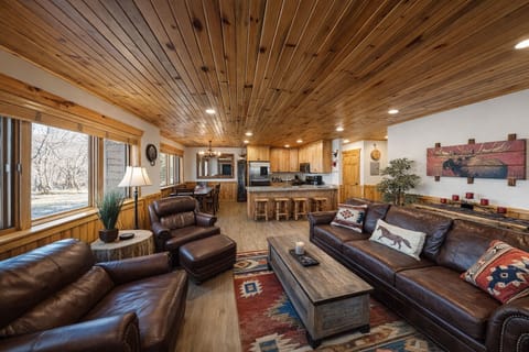Sink into rich leather seating beneath stunning wood ceilings.