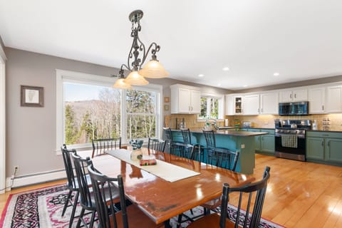 Open floor plan great for socializing. Living room is opposite kitchen.