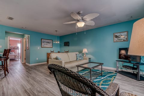 Living Area - The living area offers plenty of seating, and a television for enjoying in your down time.